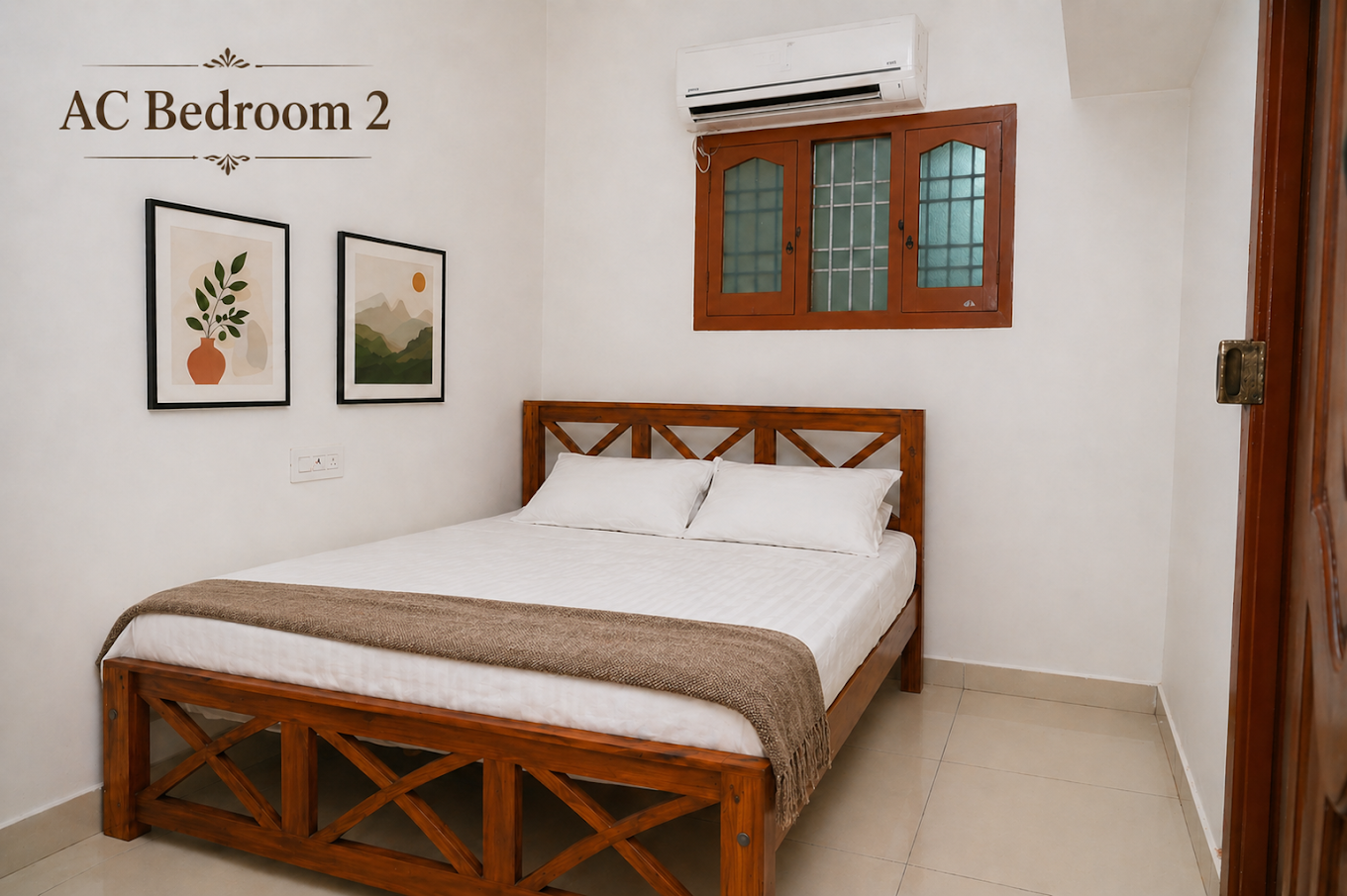 Air-conditioned bedroom at Bharathi Homestay, with a wooden double bed and white linen