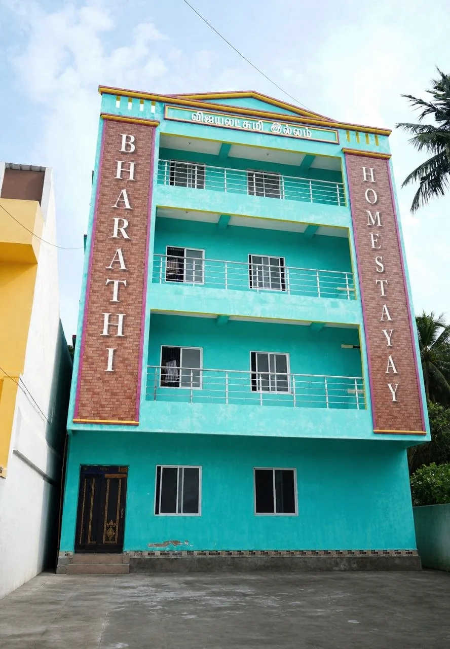 Bharathi Homestay’s teal-coloured building exterior