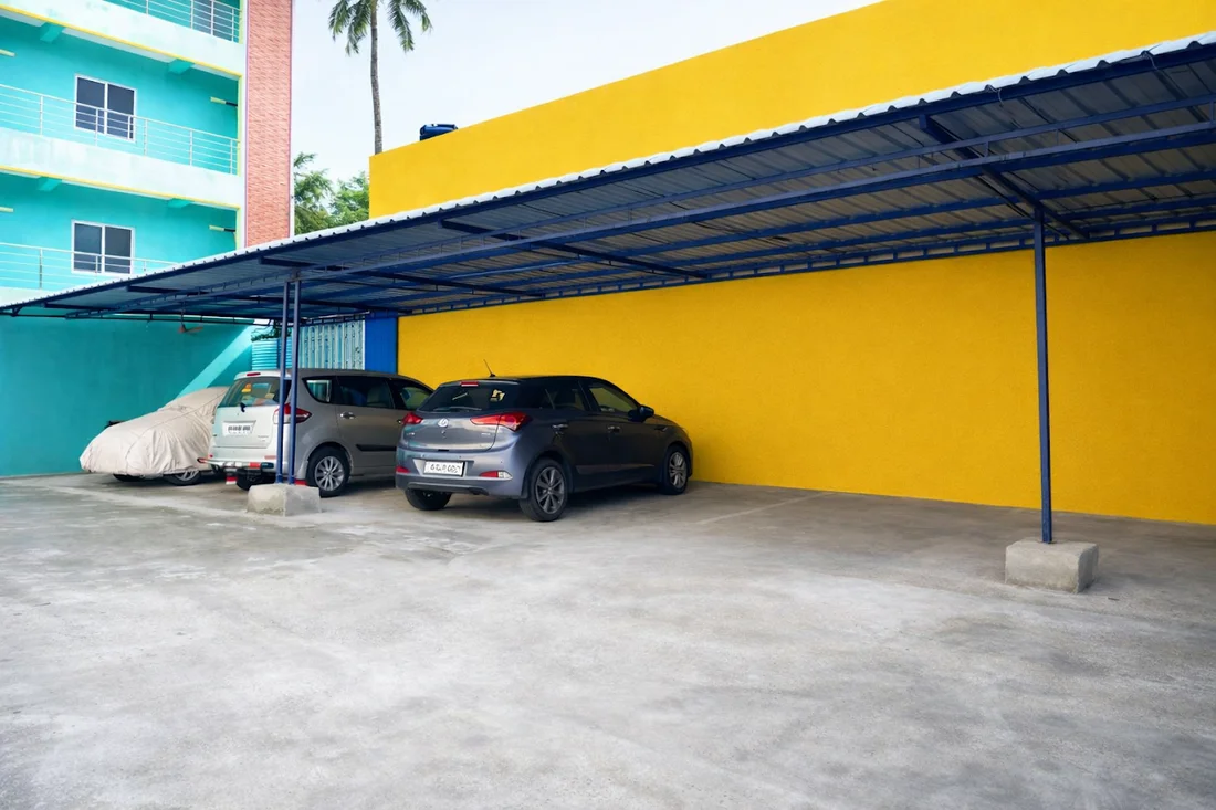 Covered parking area beside the homestay